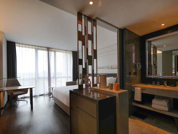 Imagen de la habitación del Hotel Novotel Shanghai Chuansha. Foto 11