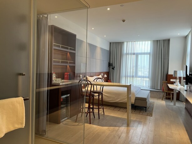 Imagen de la habitación del Hotel Novotel Shanghai Hongqiao Exhibition. Foto 11