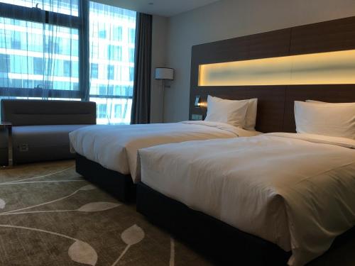 Imagen de la habitación del Hotel Novotel Shanghai Hongqiao. Foto 8