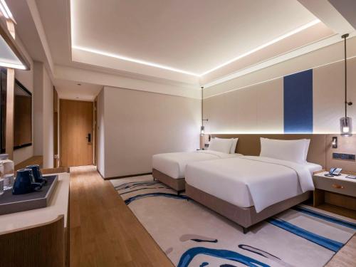 Imagen de la habitación del Hotel Novotel Shanghai Jingan. Foto 8