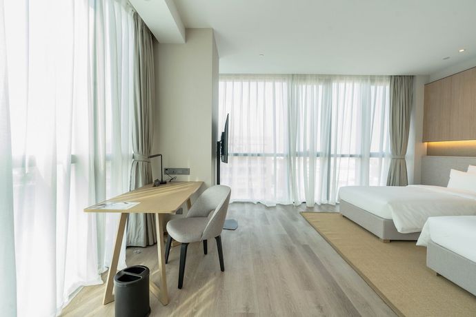 Imagen de la habitación del Hotel Novotel Shanghai Qingpu Excellence. Foto 12