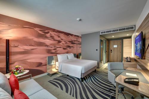 Imagen de la habitación del Hotel Novotel Sharjah Expo Centre. Foto 8