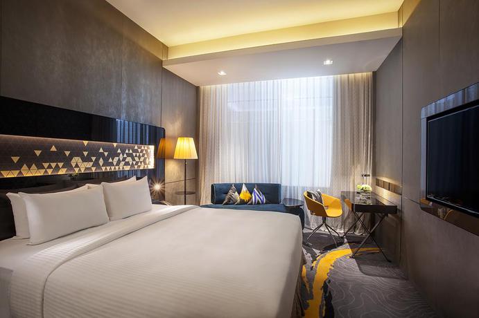 Imagen de la habitación del Hotel Novotel Singapore On Stevens. Foto 9