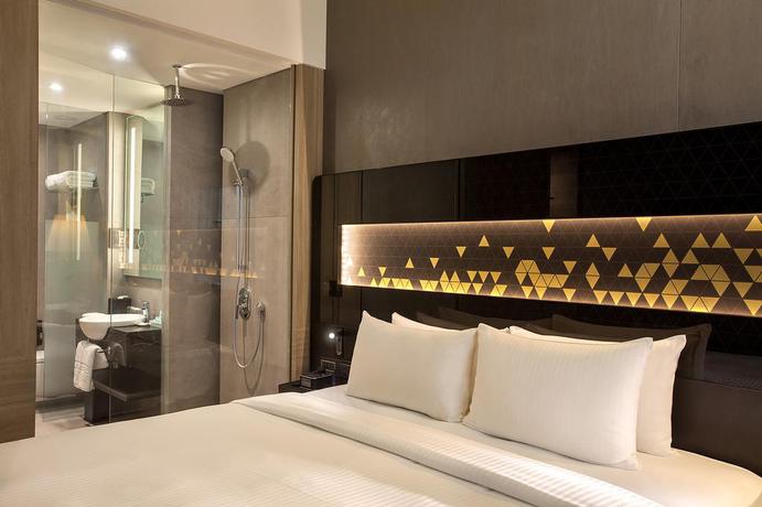 Imagen de la habitación del Hotel Novotel Singapore On Stevens. Foto 10