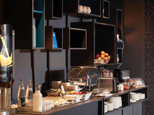 Imagen del bar/restaurante del Hotel Novotel Suites Colmar Centre. Foto 3