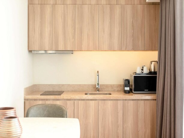 Imagen de la habitación del Hotel Novotel Suites Manila At Acqua. Foto 17