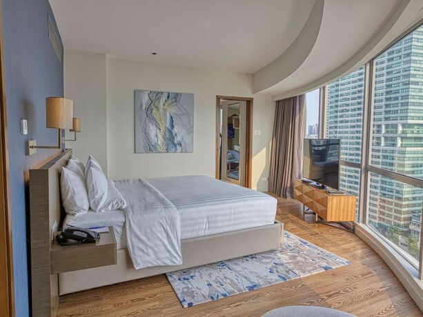 Imagen de la habitación del Hotel Novotel Suites Manila At Acqua. Foto 20