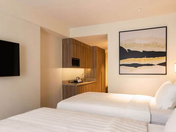 Imagen de la habitación del Hotel Novotel Suites Manila At Acqua. Foto 28