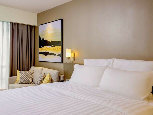 Imagen de la habitación del Hotel Novotel Suites Manila At Acqua. Foto 30