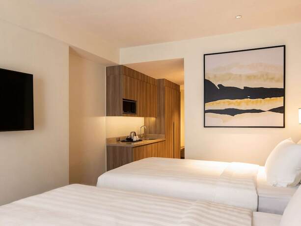 Imagen de la habitación del Hotel Novotel Suites Manila At Acqua. Foto 31