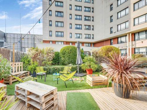 Imagen de los interiores del Hotel Novotel Suites Paris Montreuil Vincennes. Foto 9