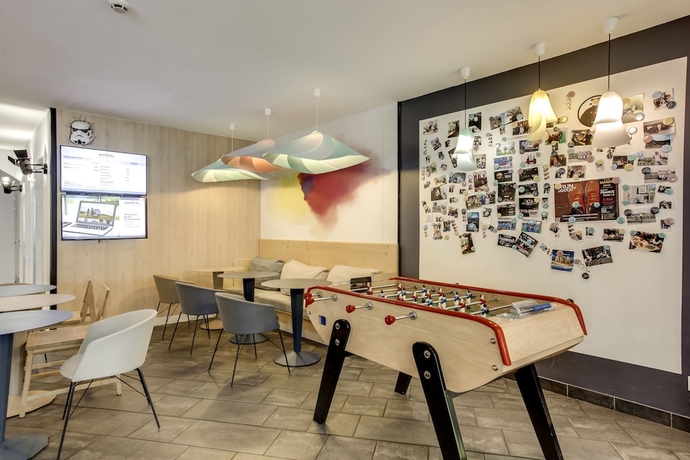 Imagen de los interiores del Hotel Novotel Suites Paris Stade De France. Foto 19