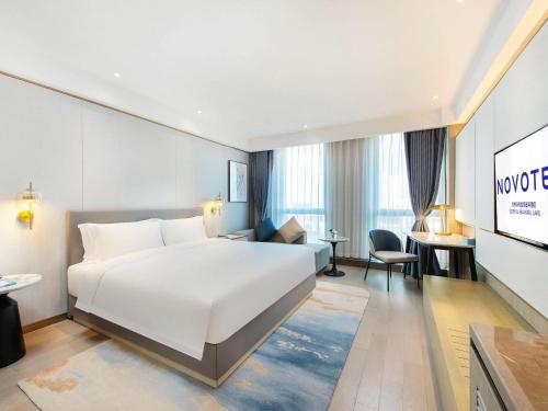 Imagen de la habitación del Hotel Novotel Suzhou Huanxiu Lake. Foto 11