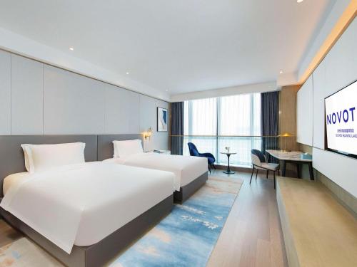 Imagen de la habitación del Hotel Novotel Suzhou Huanxiu Lake. Foto 15