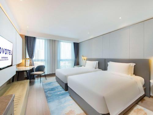 Imagen de la habitación del Hotel Novotel Suzhou Huanxiu Lake. Foto 16