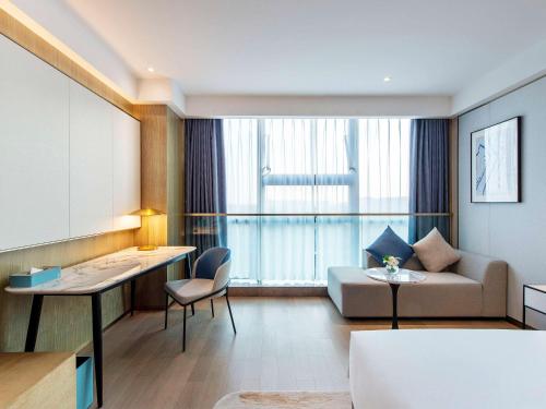 Imagen de la habitación del Hotel Novotel Suzhou Huanxiu Lake. Foto 17