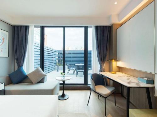 Imagen de la habitación del Hotel Novotel Suzhou Huanxiu Lake. Foto 18