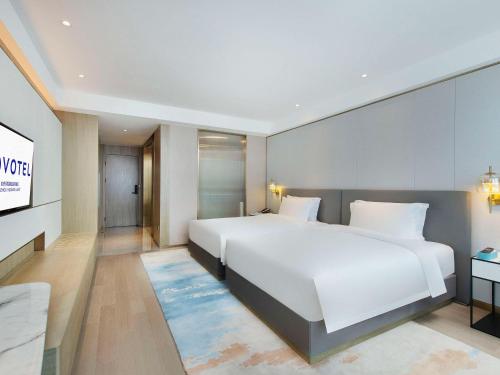 Imagen de la habitación del Hotel Novotel Suzhou Huanxiu Lake. Foto 19
