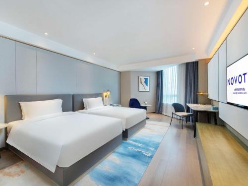 Imagen de la habitación del Hotel Novotel Suzhou Huanxiu Lake. Foto 20