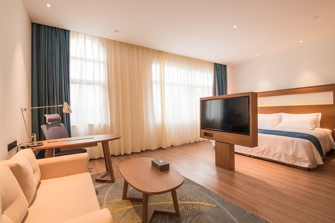 Imagen de la habitación del Hotel Novotel Suzhou Tai Lake Santeh. Foto 14