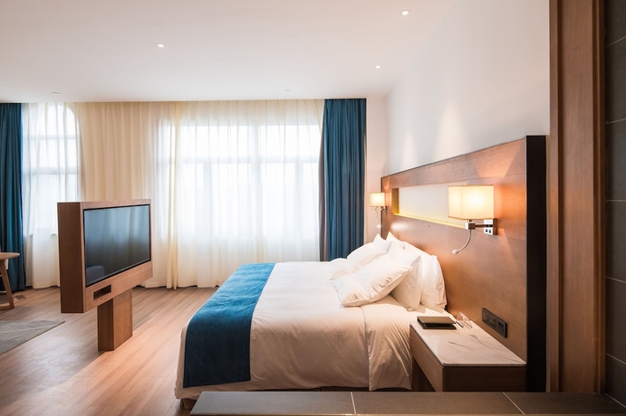 Imagen de la habitación del Hotel Novotel Suzhou Tai Lake Santeh. Foto 15