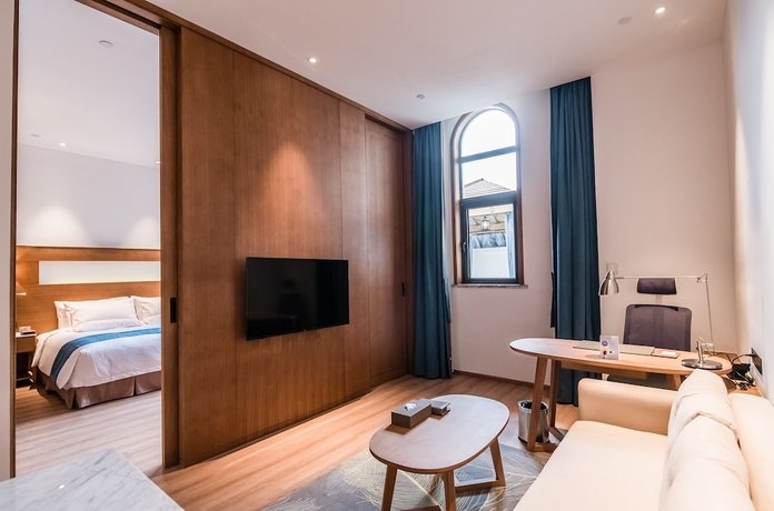 Imagen de la habitación del Hotel Novotel Suzhou Tai Lake Santeh. Foto 17