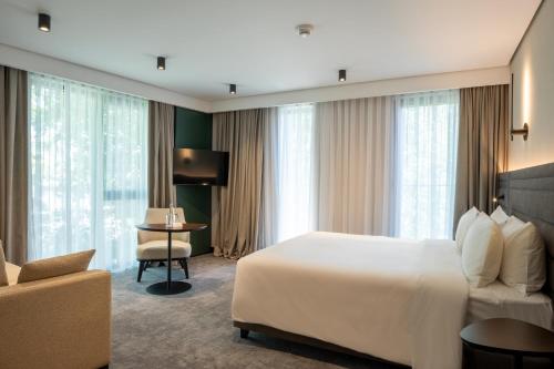 Imagen de la habitación del Hotel Novotel Tbilisi Center. Foto 18