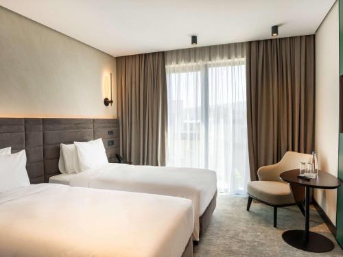 Imagen de la habitación del Hotel Novotel Tbilisi Center. Foto 20