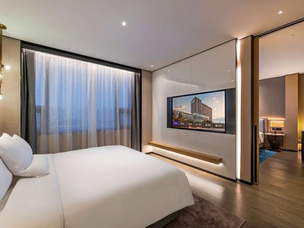 Imagen de la habitación del Hotel Novotel Tianjin Drum Tower. Foto 8