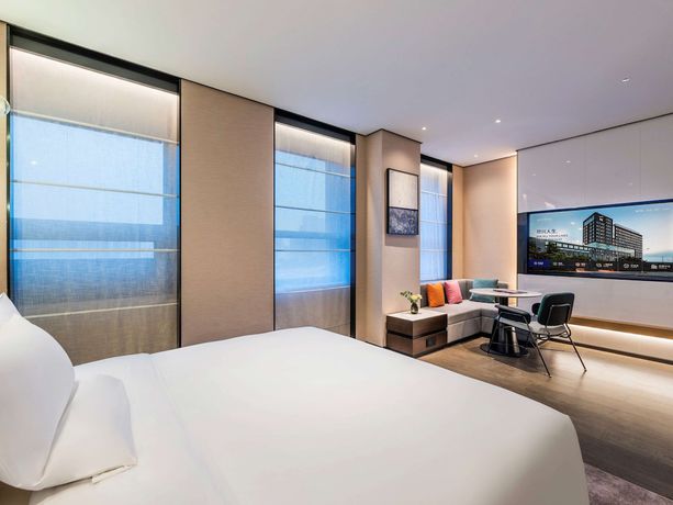 Imagen de la habitación del Hotel Novotel Tianjin Drum Tower. Foto 9