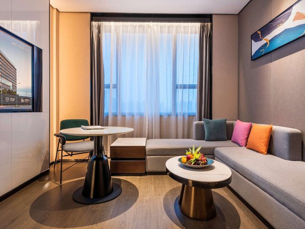 Imagen de la habitación del Hotel Novotel Tianjin Drum Tower. Foto 11