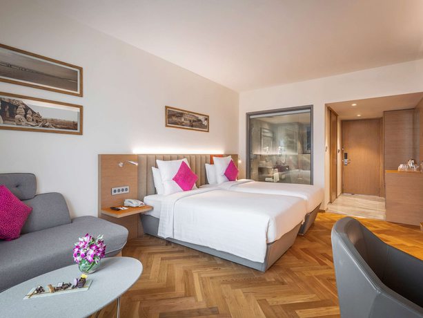 Imagen de la habitación del Hotel Novotel Vijayawada Varun. Foto 6