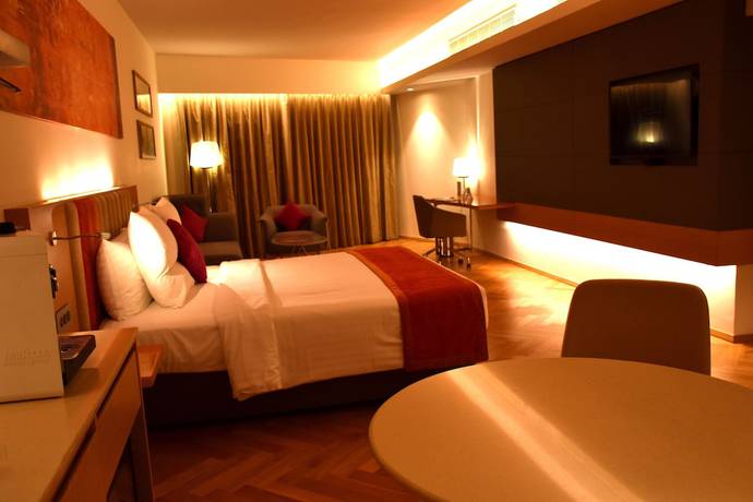 Imagen de la habitación del Hotel Novotel Vijayawada Varun. Foto 11