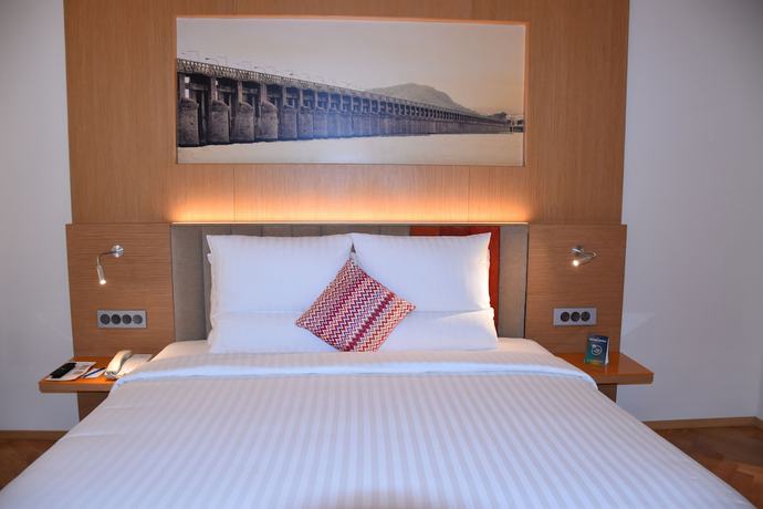 Imagen de la habitación del Hotel Novotel Vijayawada Varun. Foto 12