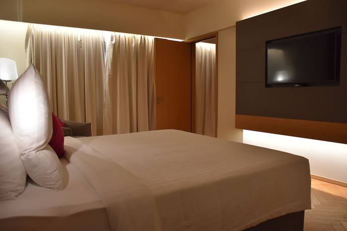 Imagen de la habitación del Hotel Novotel Vijayawada Varun. Foto 13
