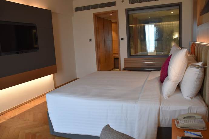 Imagen de la habitación del Hotel Novotel Vijayawada Varun. Foto 14