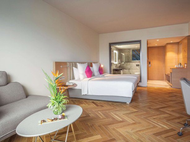 Imagen de la habitación del Hotel Novotel Vijayawada Varun. Foto 18