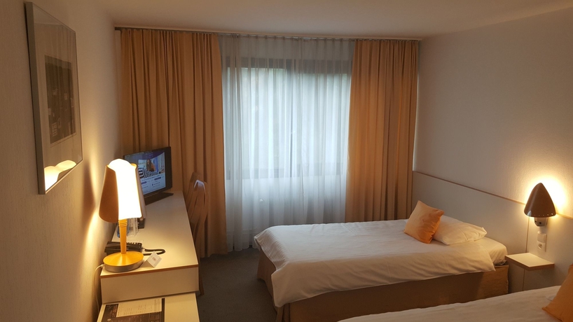 Imagen de la habitación del Hotel Novotel Wroclaw City. Foto 7