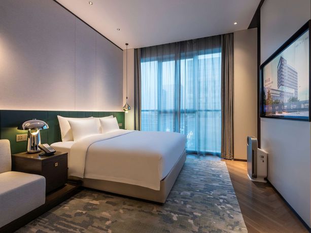 Imagen de la habitación del Hotel Novotel Xian Xixian. Foto 9