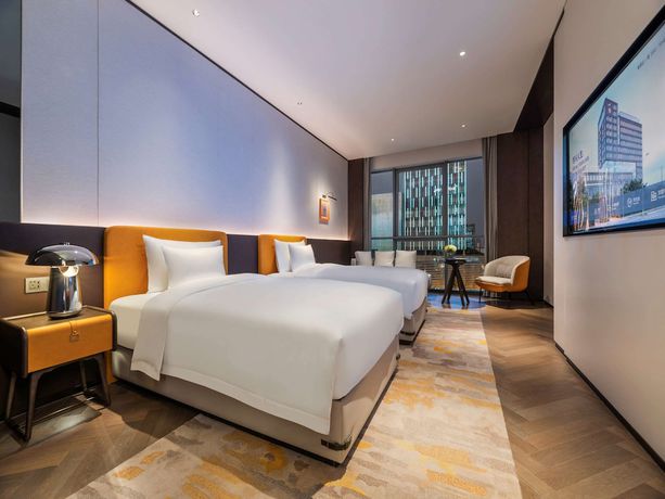 Imagen de la habitación del Hotel Novotel Xian Xixian. Foto 14