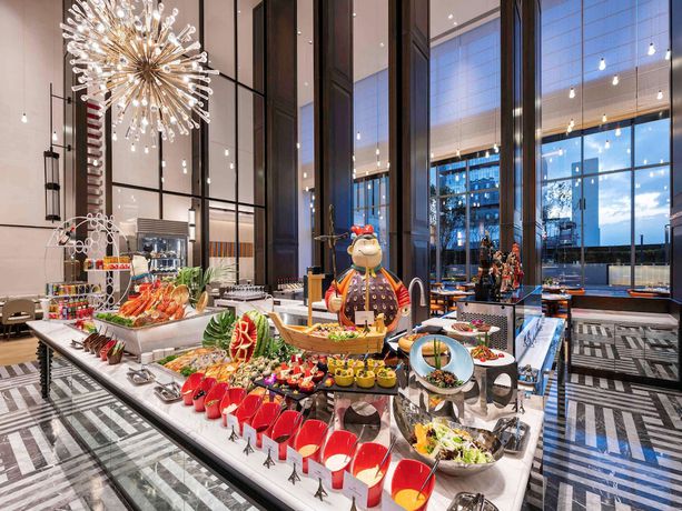 Imagen del bar/restaurante del Hotel Novotel Xian Xixian. Foto 2