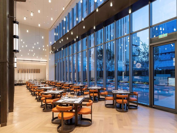 Imagen del bar/restaurante del Hotel Novotel Xian Xixian. Foto 5