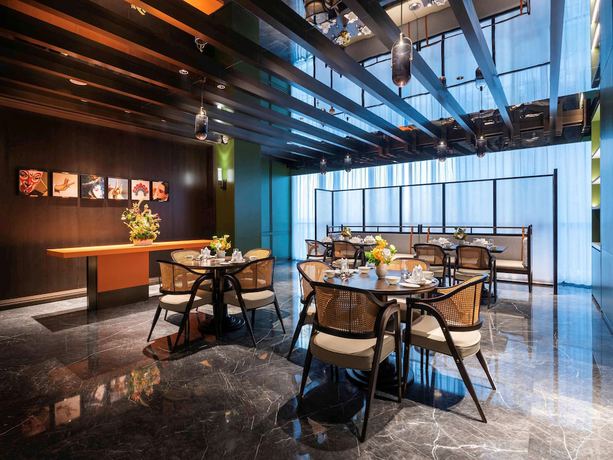 Imagen del bar/restaurante del Hotel Novotel Xian Xixian. Foto 7