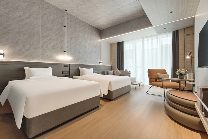 Imagen de la habitación del Hotel Novotel Yinchuan Lanxigu. Foto 6