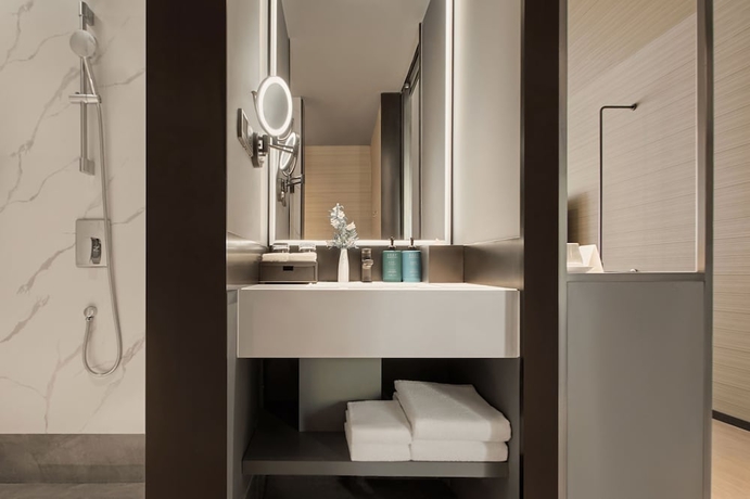 Imagen de la habitación del Hotel Novotel Yinchuan Lanxigu. Foto 7