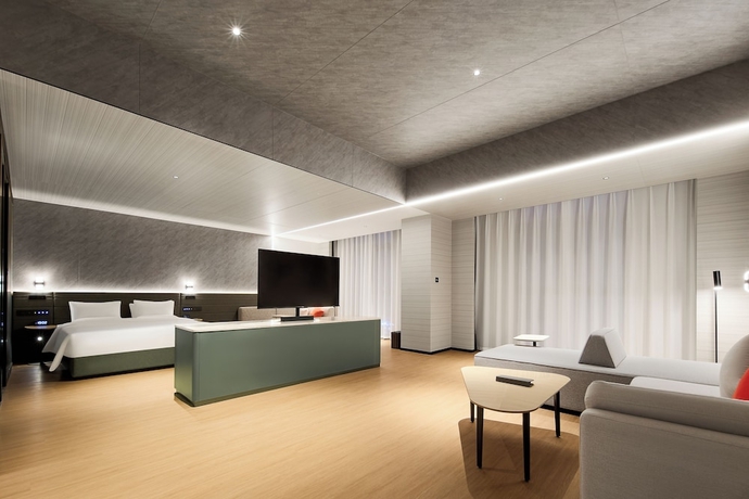 Imagen de la habitación del Hotel Novotel Yinchuan Lanxigu. Foto 9