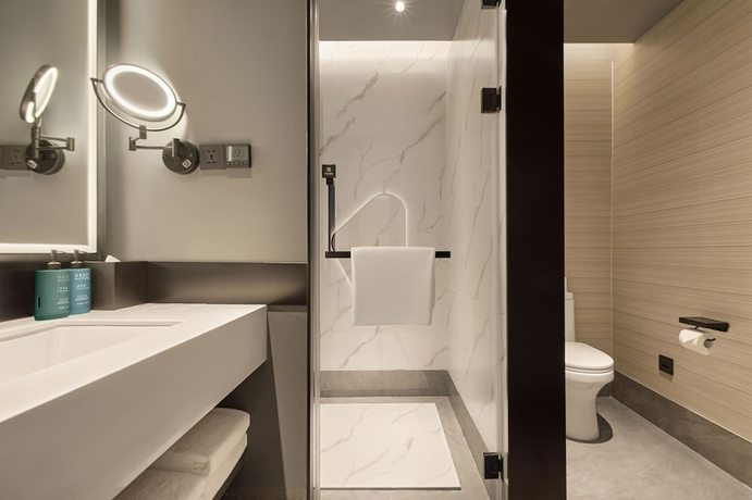 Imagen de la habitación del Hotel Novotel Yinchuan Lanxigu. Foto 11