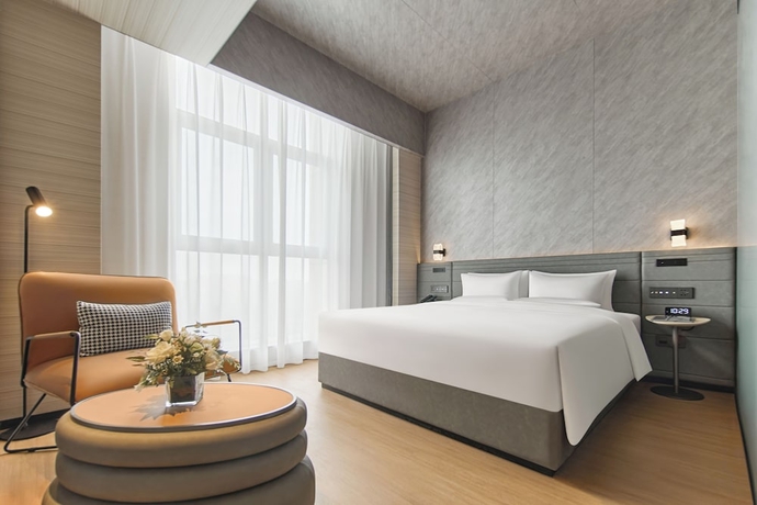 Imagen de la habitación del Hotel Novotel Yinchuan Lanxigu. Foto 12