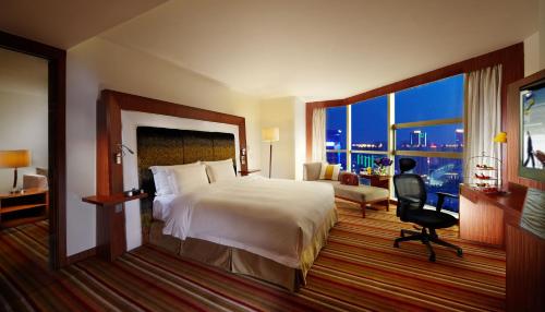 Imagen de la habitación del Hotel Novotel Zhengzhou Convention Centre. Foto 6