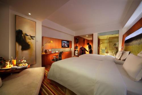 Imagen de la habitación del Hotel Novotel Zhengzhou Convention Centre. Foto 8